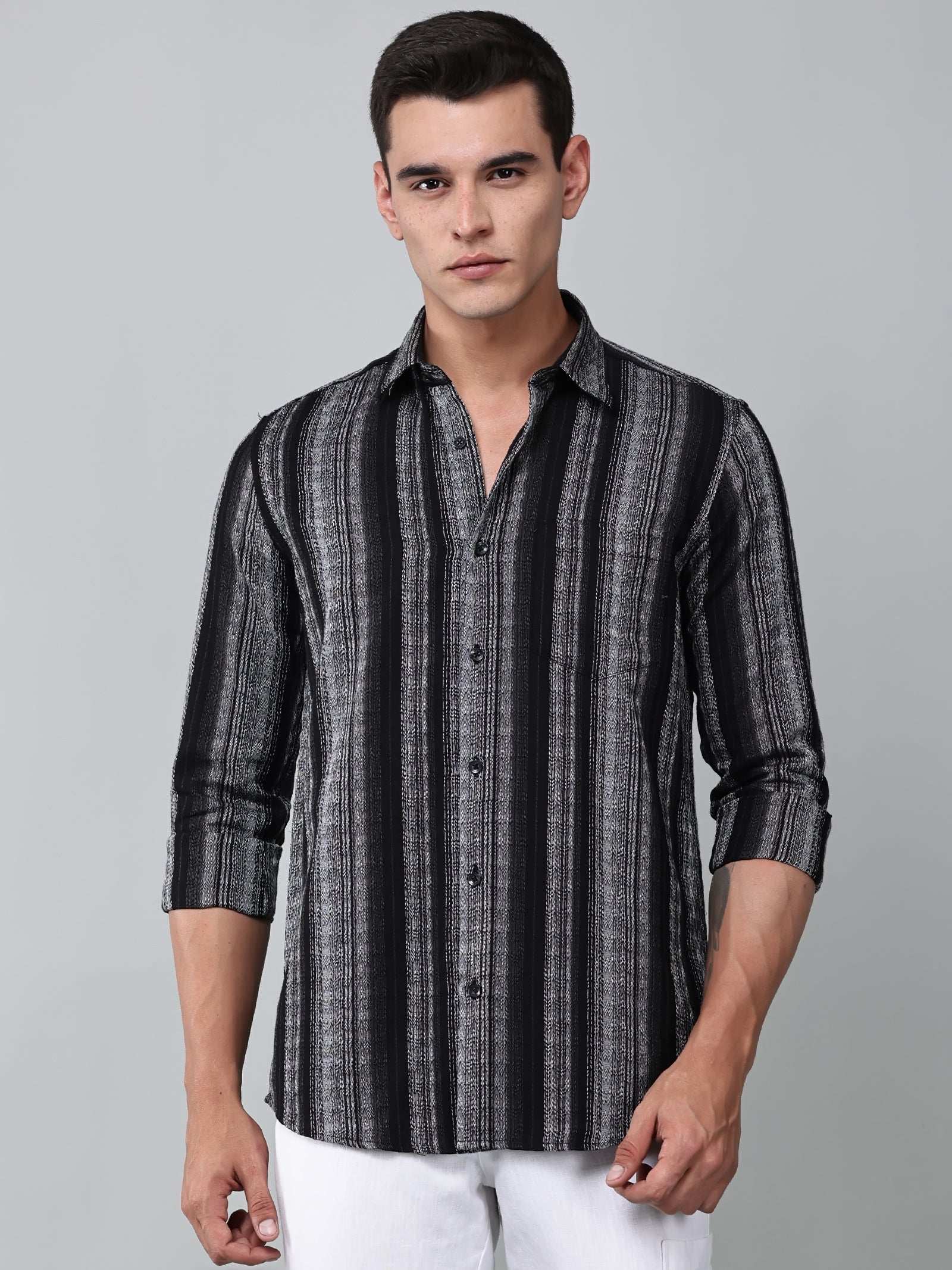 model wearing a noir (black) echo textured stripe shirt 