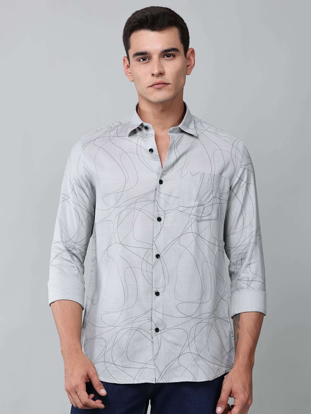 a model wearing a linear drift sketch grey shirt