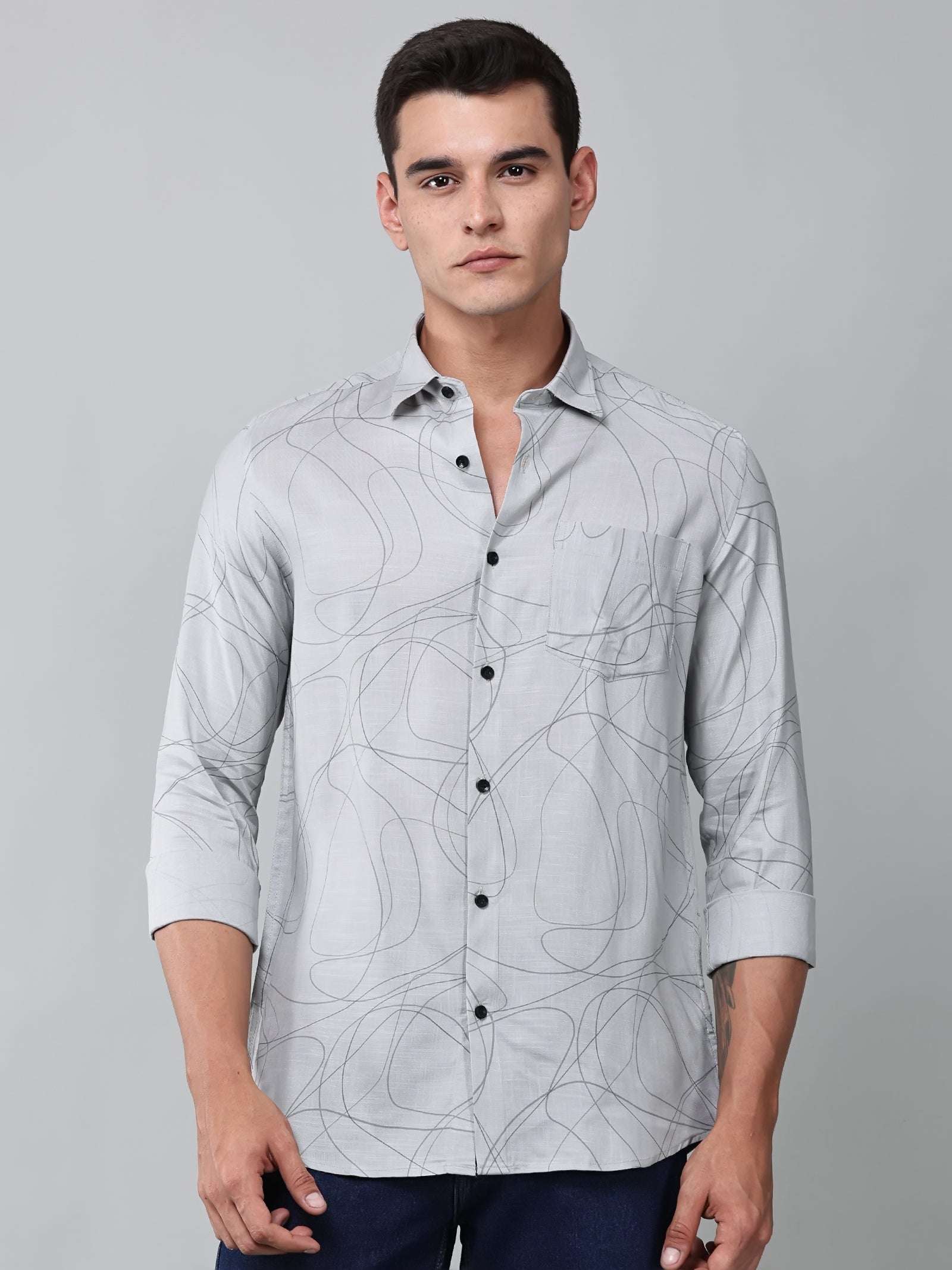 a model wearing a linear drift sketch grey shirt