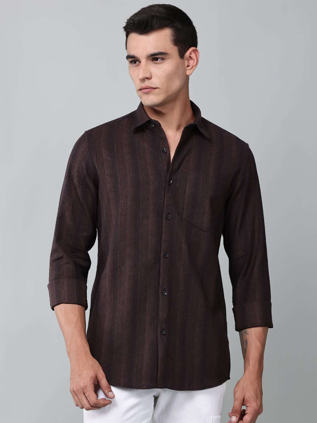 a model wearing a midnight noir (black) maroon shirt