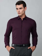 a model wearing a signature textured stretch formal purple shirt