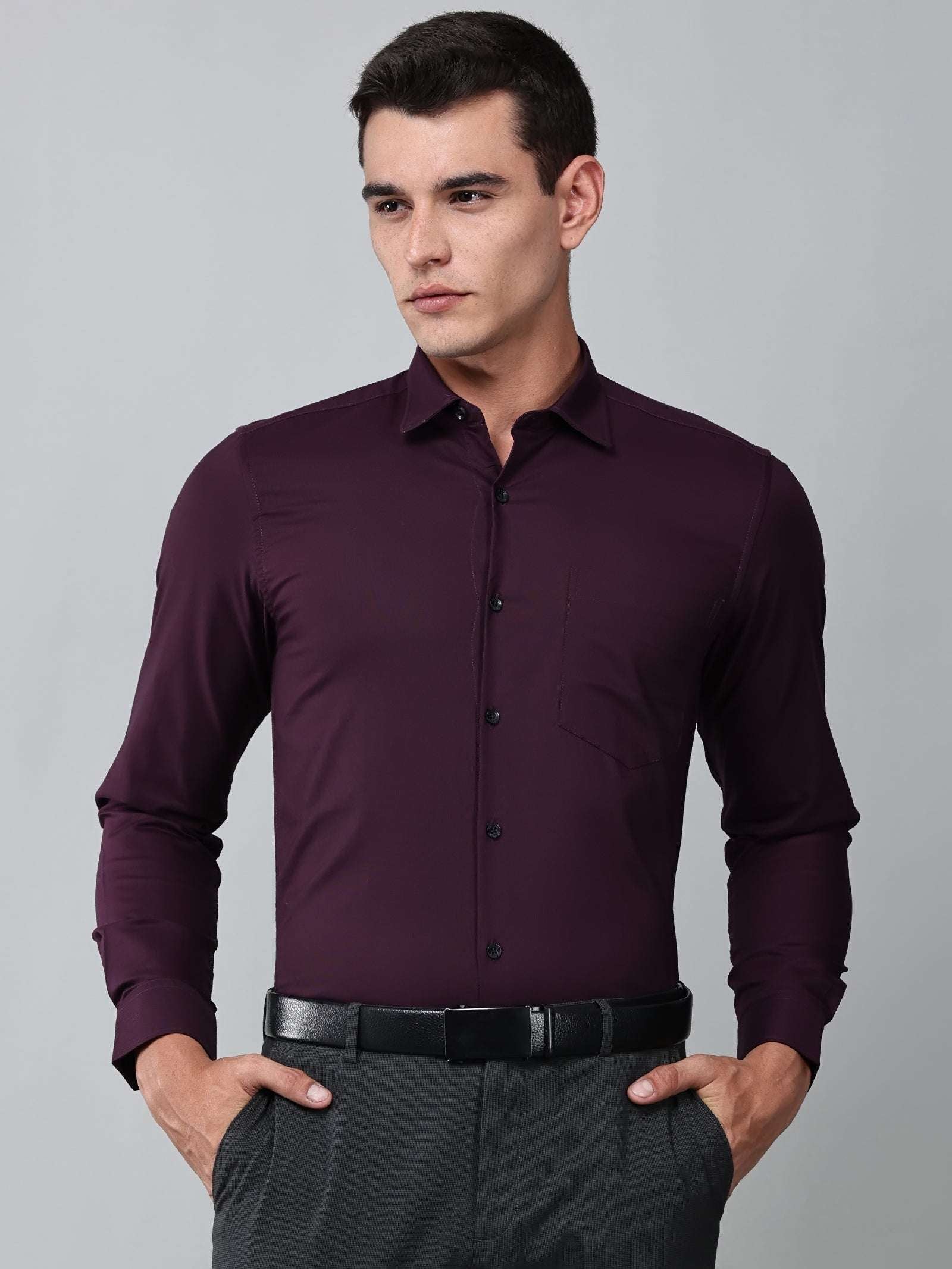 a model wearing a signature textured stretch formal purple shirt