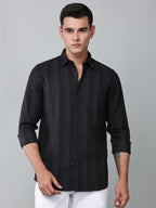 a model wearing a midnight noir (black) obsidian shirt