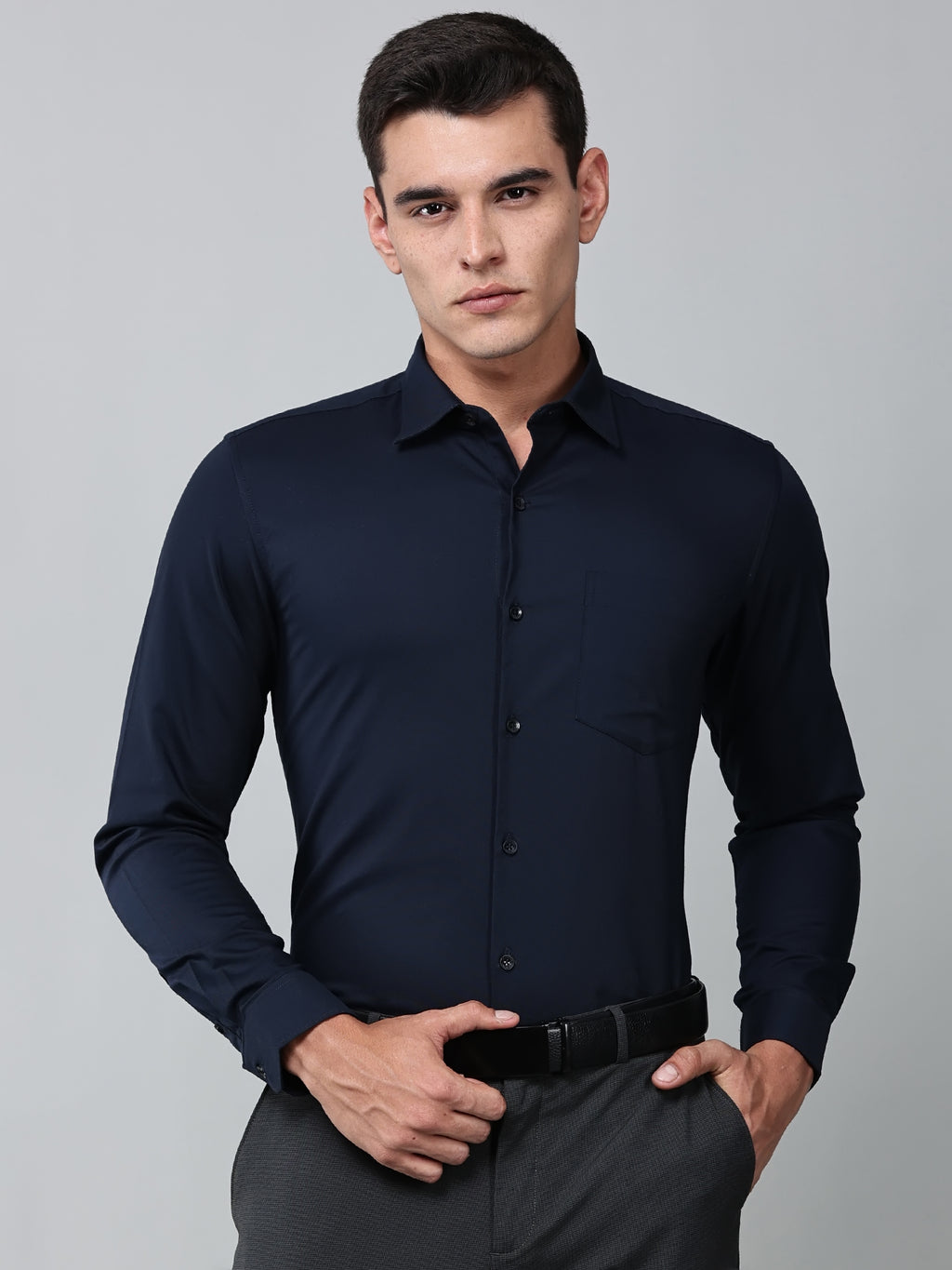 a model wearing a signature textured stretch formal navy blue shirt