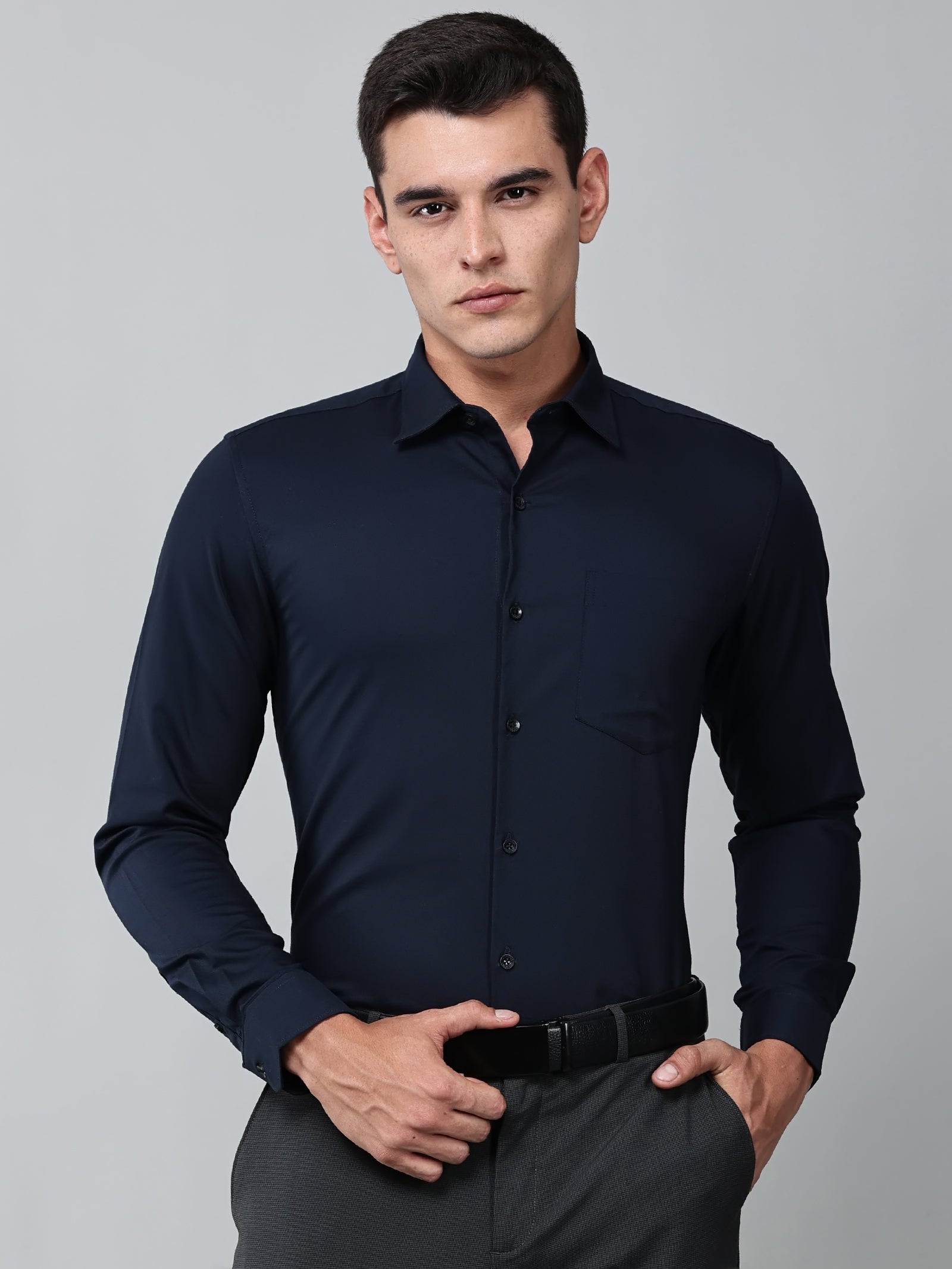 a model wearing a signature textured stretch formal navy blue shirt