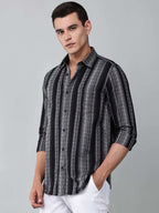model wearing a noir (black) echo textured stripe shirt 