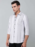 model wearing a white and charcoal textured stripe shirt