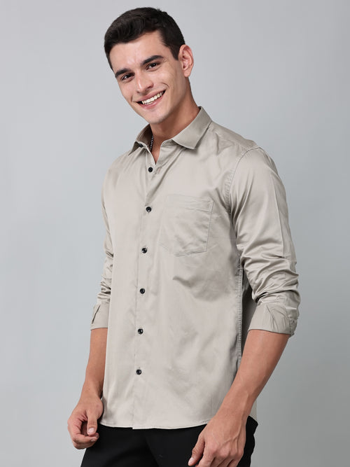 a model wearing a luxe satin ivory stone shirt