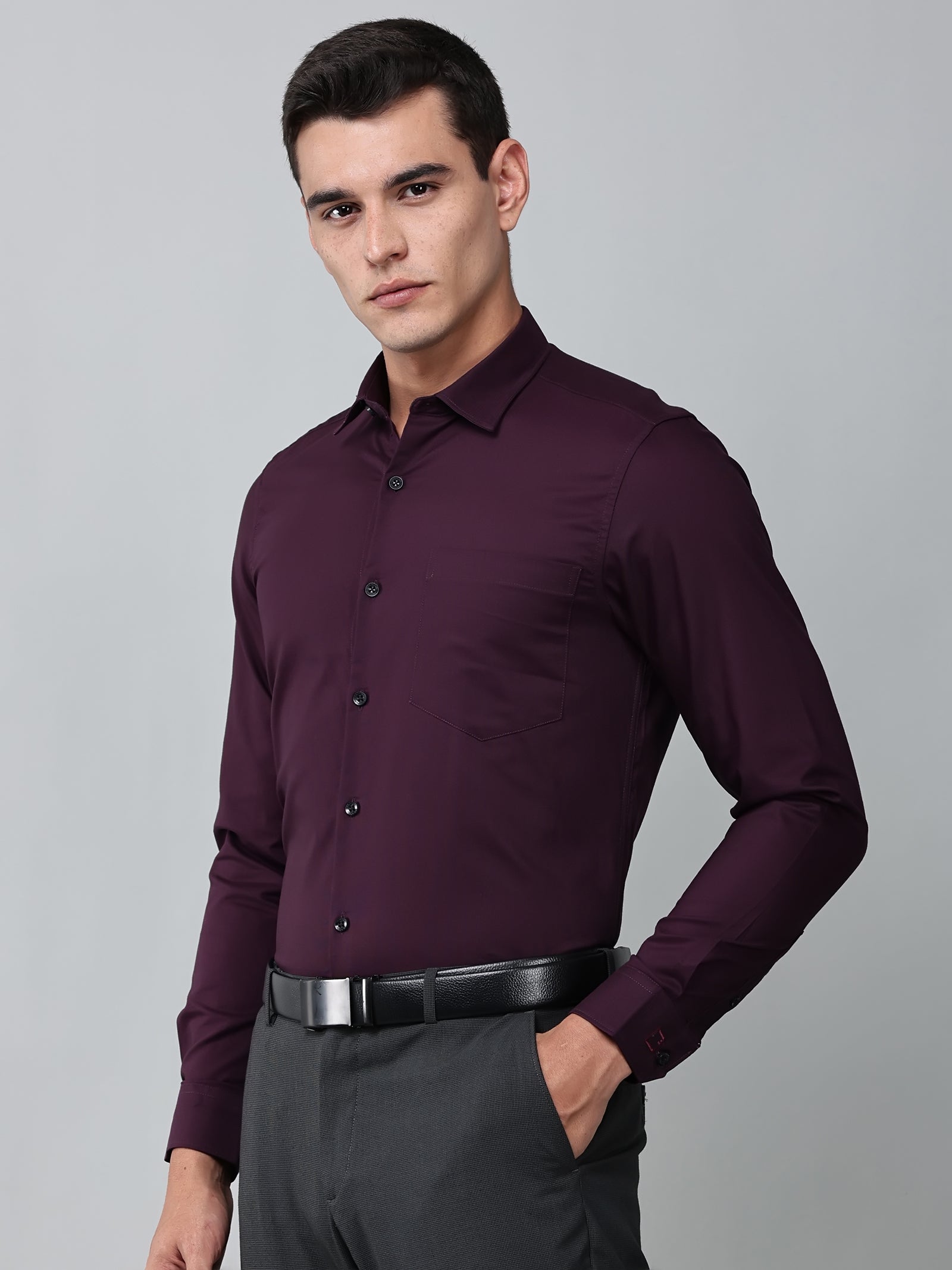 a model wearing a signature textured stretch formal purple shirt