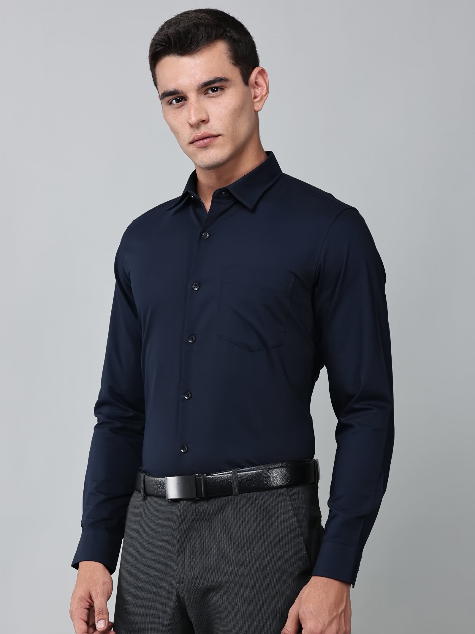 a model wearing a signature textured stretch formal navy blue shirt