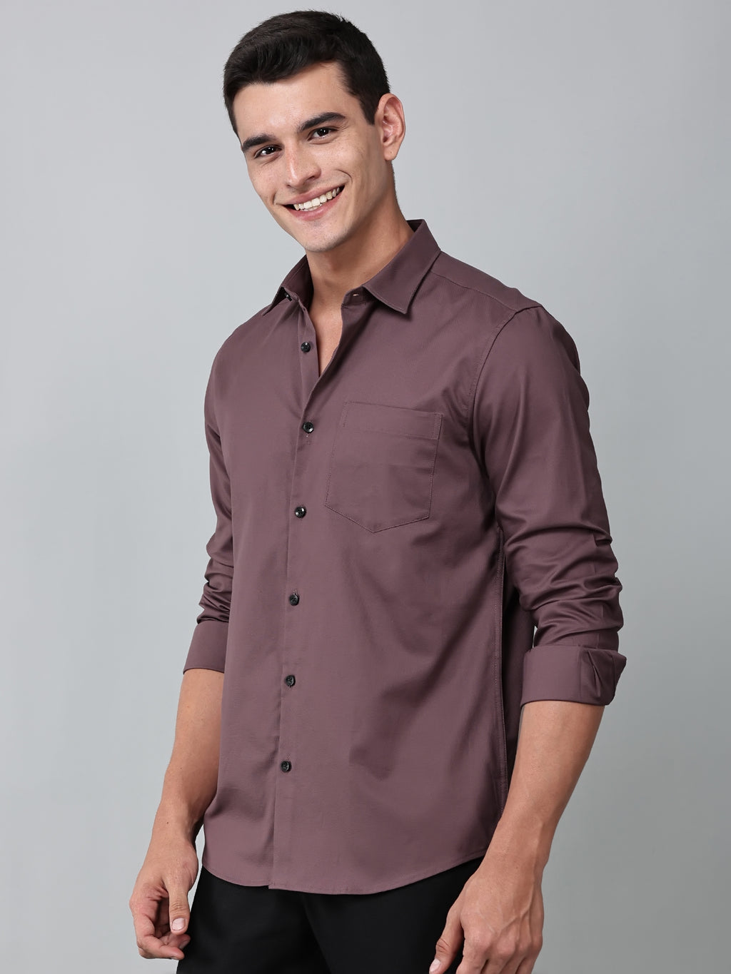a model wearing a contour textured dusty rose shirt