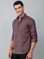 a model wearing a contour textured dusty rose shirt