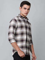 a model wearing a crimson (red) ombre checkered shirt