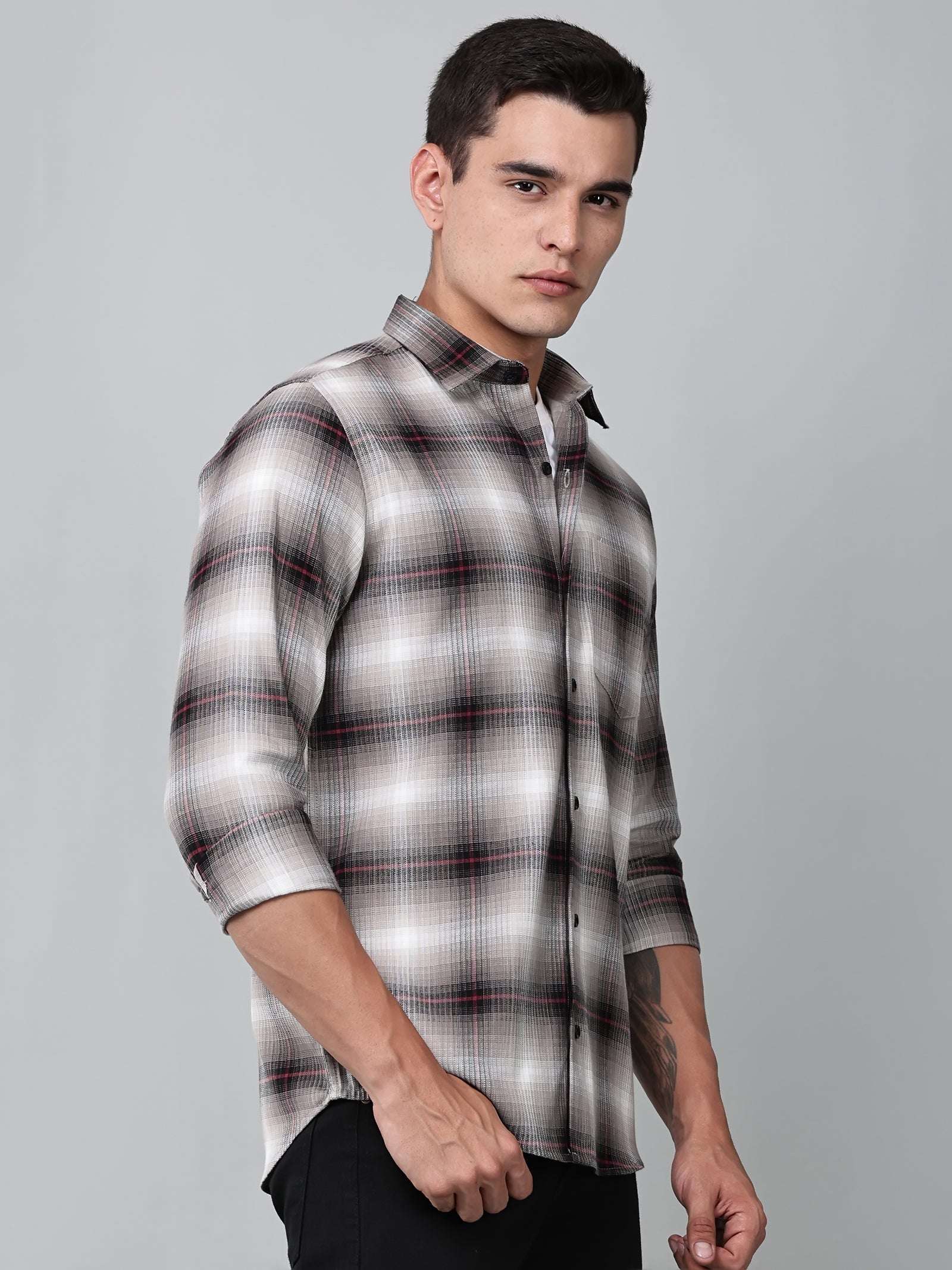 a model wearing a crimson (red) ombre checkered shirt