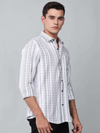 model wearing a white and charcoal textured stripe shirt