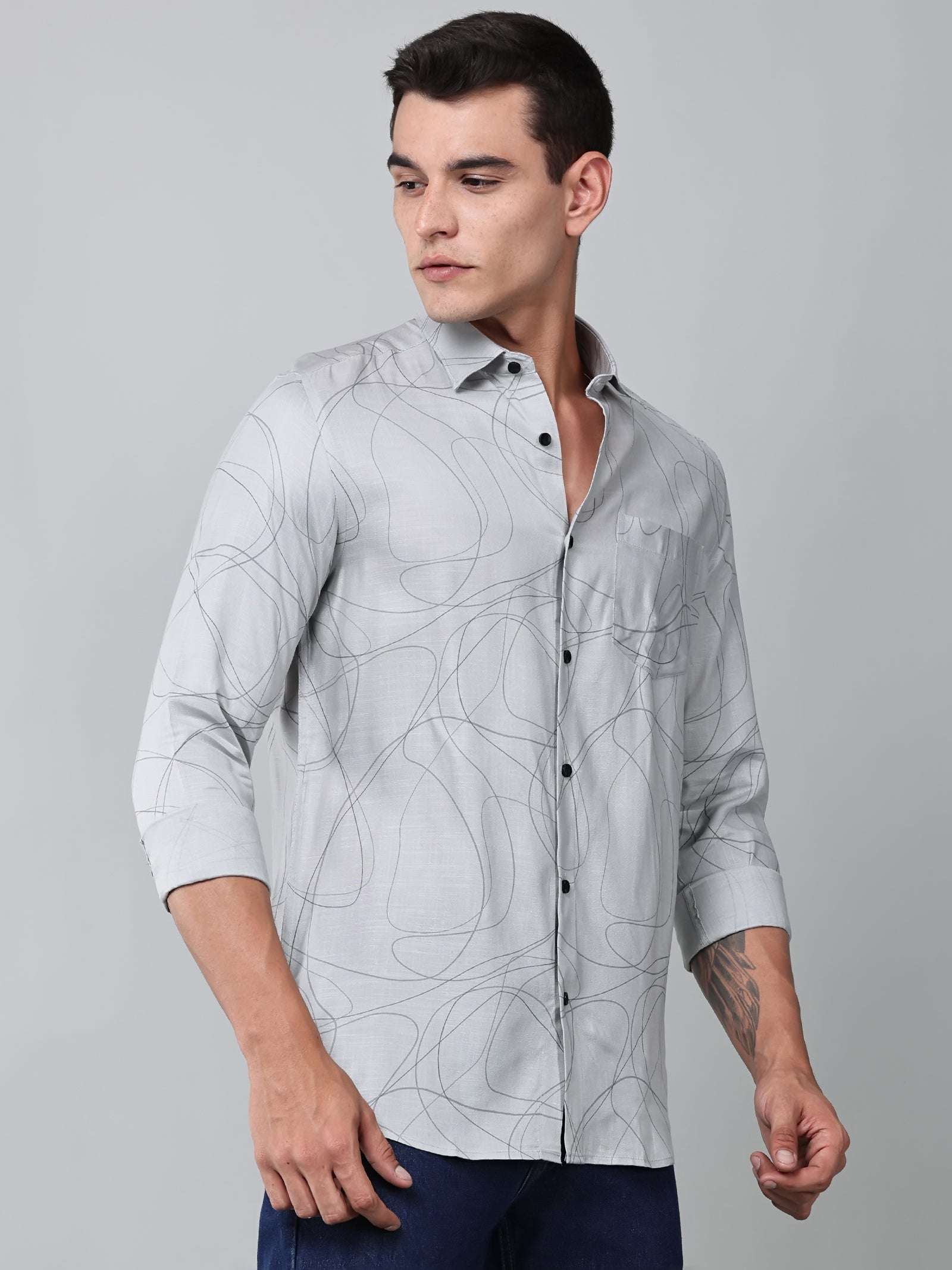 a model wearing a linear drift sketch grey shirt