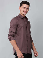 a model wearing a contour textured dusty rose shirt
