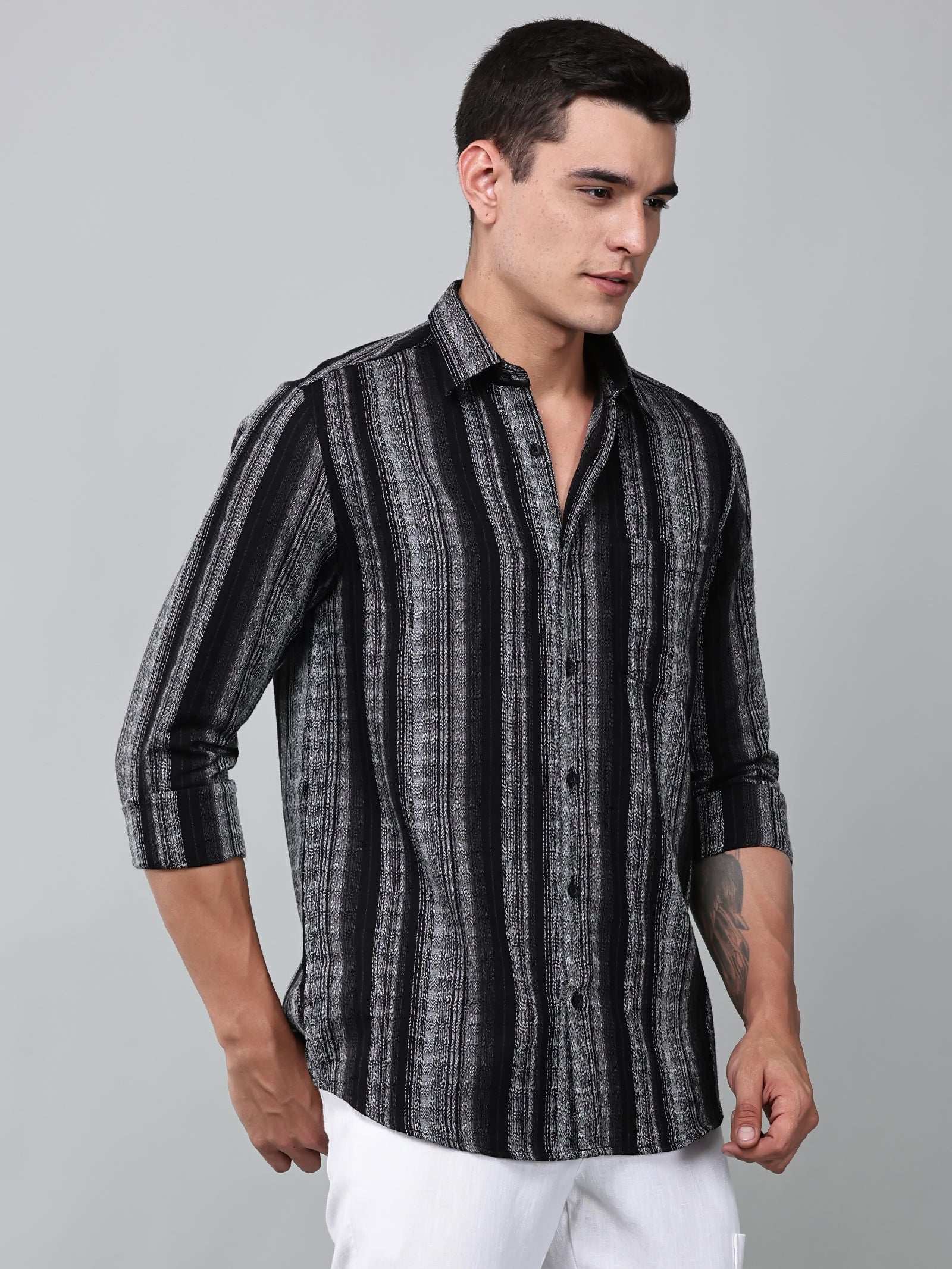 model wearing a noir (black) echo textured stripe shirt 