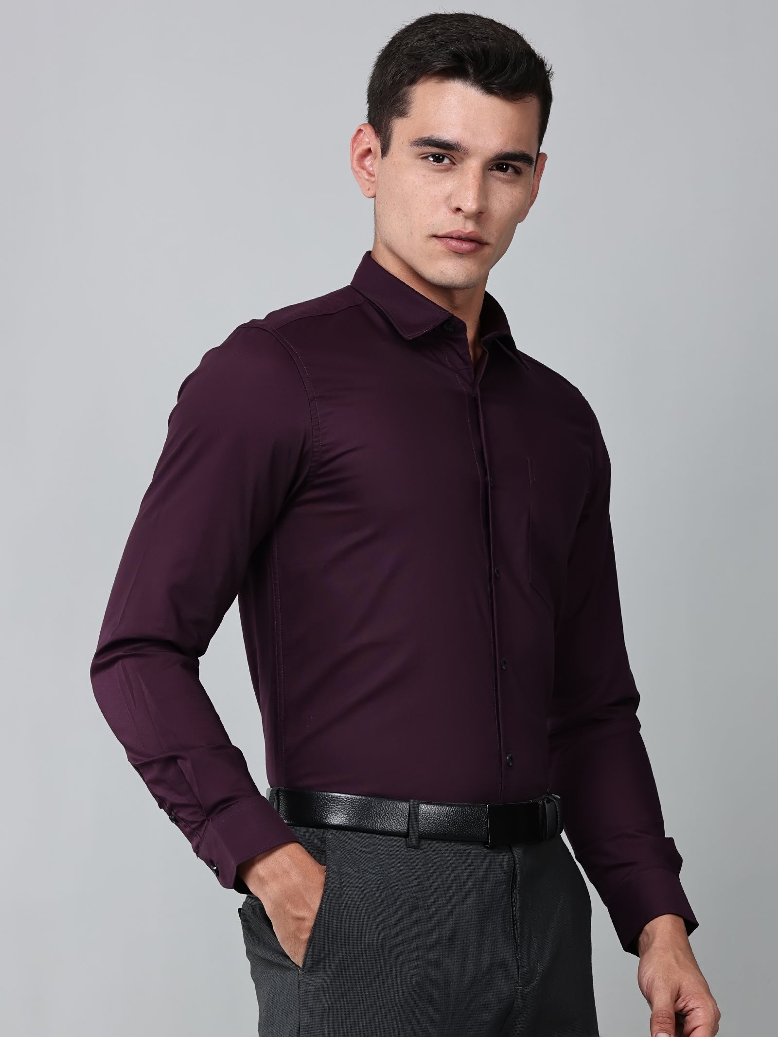 a model wearing a signature textured stretch formal purple shirt