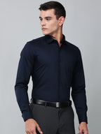 a model wearing a signature textured stretch formal navy blue shirt