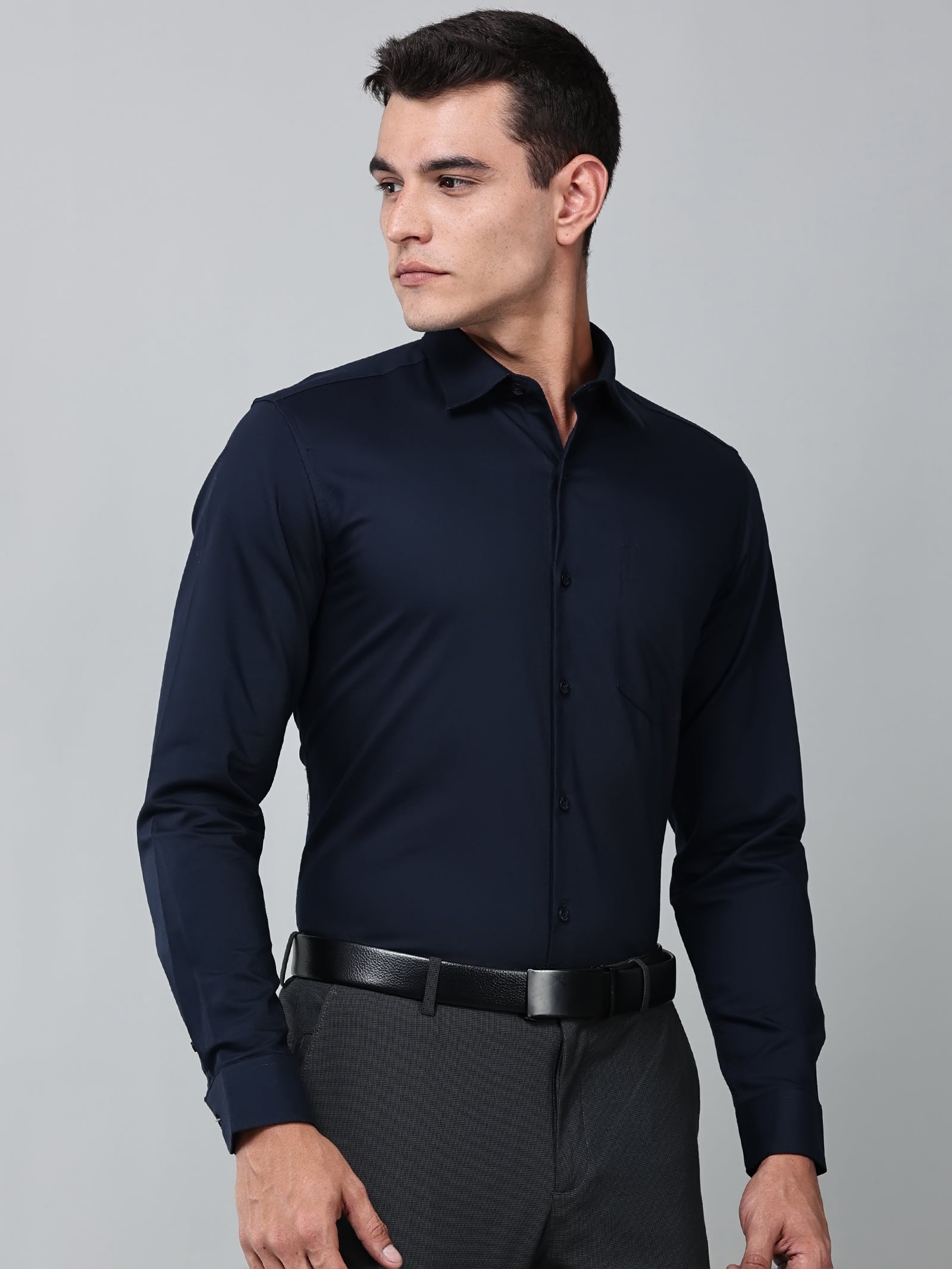 a model wearing a signature textured stretch formal navy blue shirt