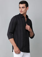 a model wearing a midnight noir (black) obsidian shirt
