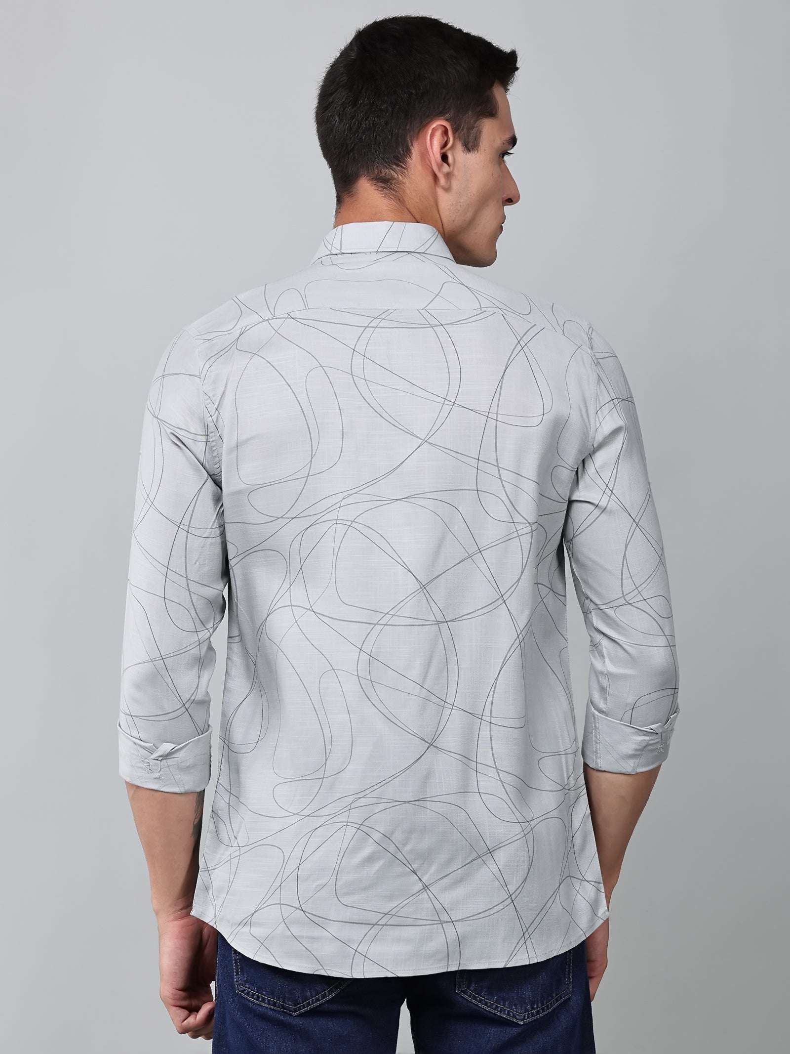 a model wearing a linear drift sketch grey shirt