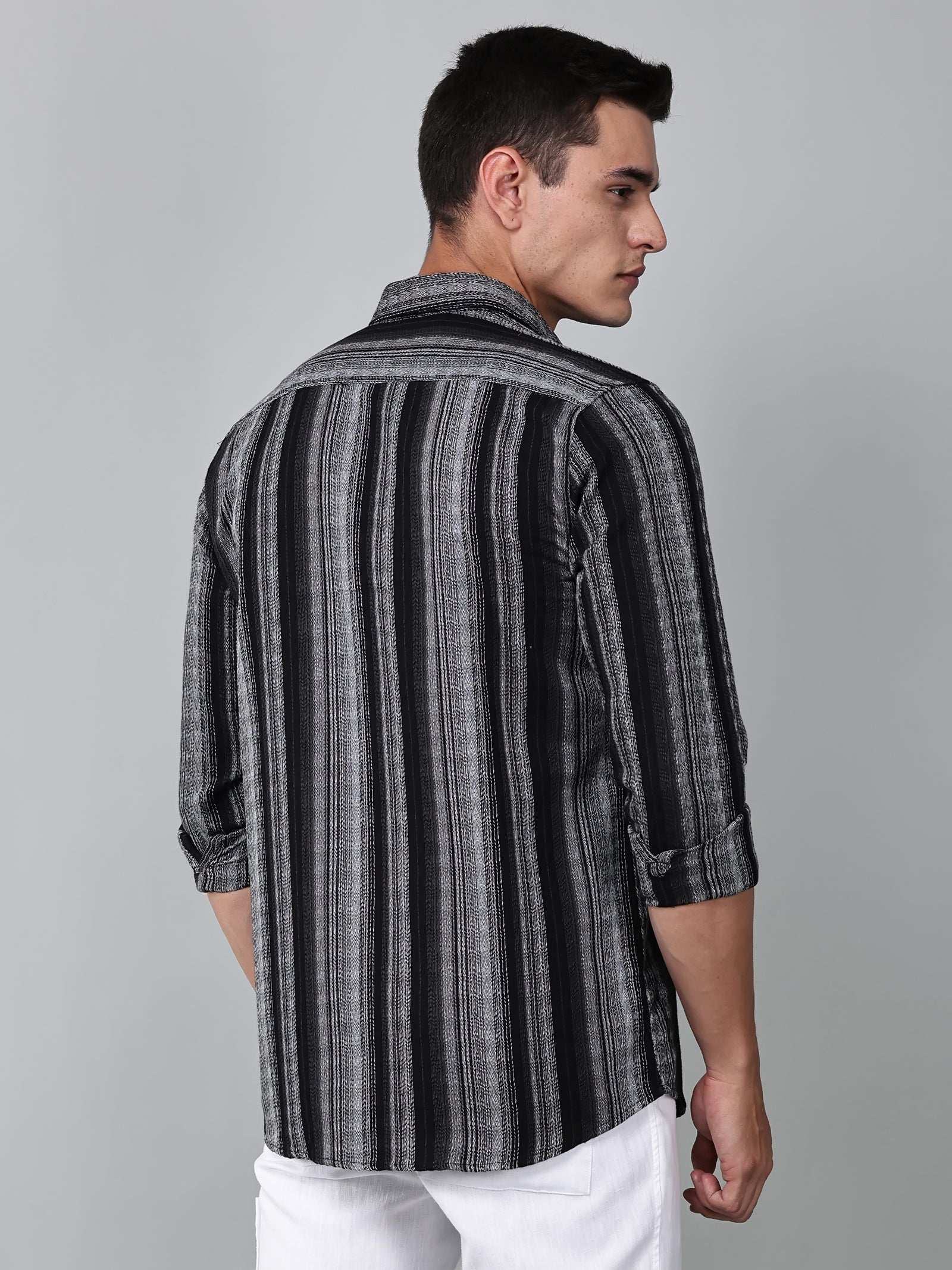 model wearing a noir (black) echo textured stripe shirt