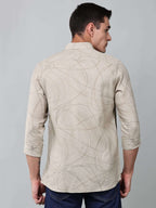 a model wearing a linear drift sketch beige shirt