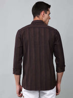 a model wearing a midnight noir (black) maroon shirt