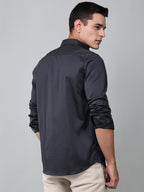 model wearing a luxe satin charcoal grey shirt