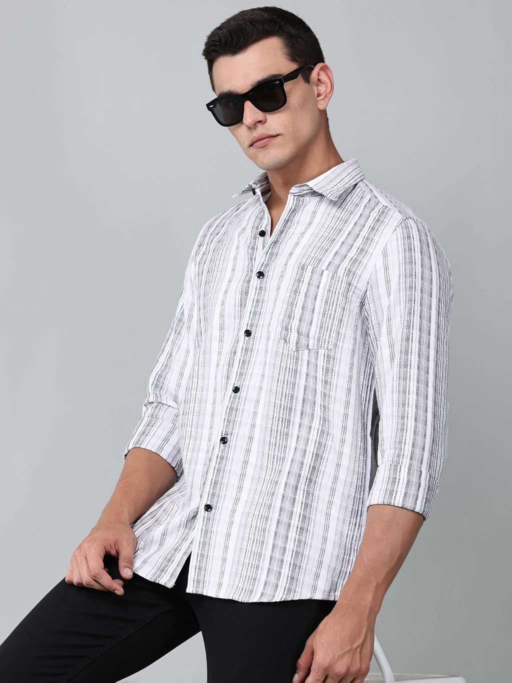 model wearing a white and charcoal textured stripe shirt