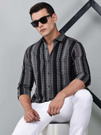 model wearing a noir (black) echo textured stripe shirt