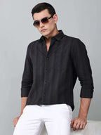 a model wearing a midnight noir (black) obsidian shirt