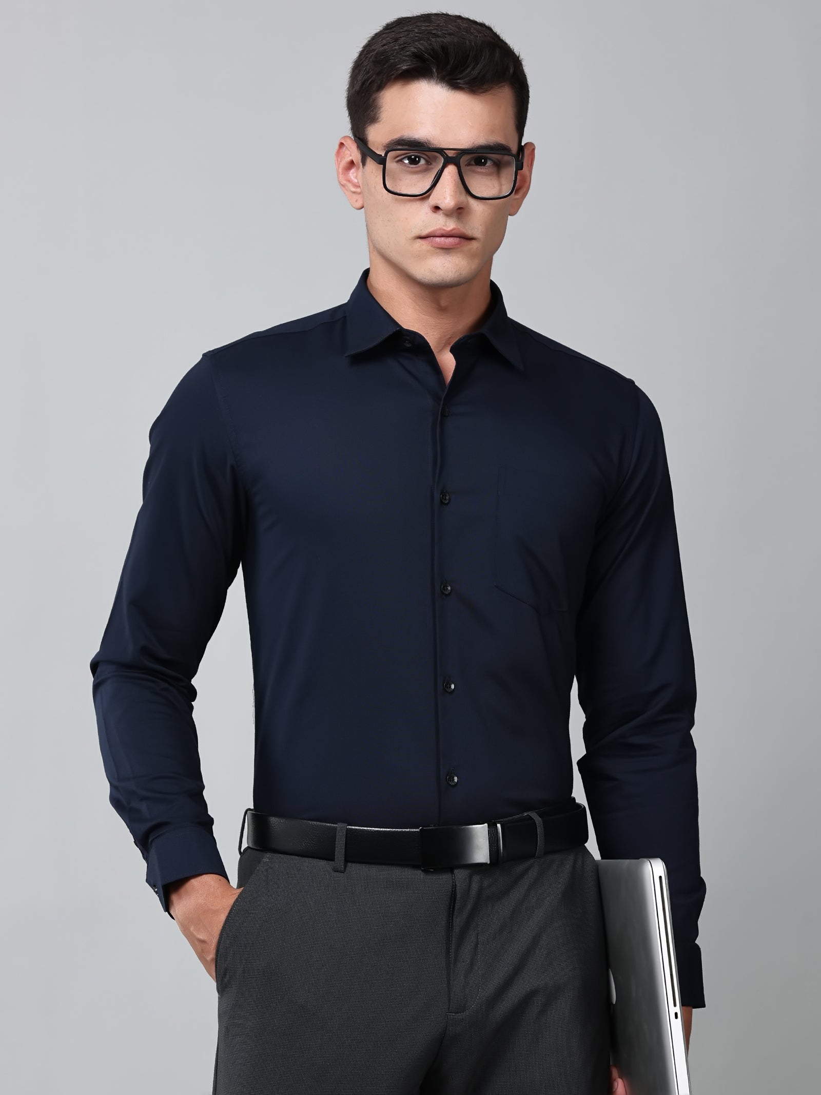 a model wearing a signature textured stretch formal navy blue shirt