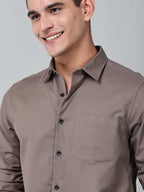 close up shot of a model wearing a contour textured smoky mauve shirt
