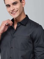 close up shot of a model wearing a luxe satin charcoal grey shirt
