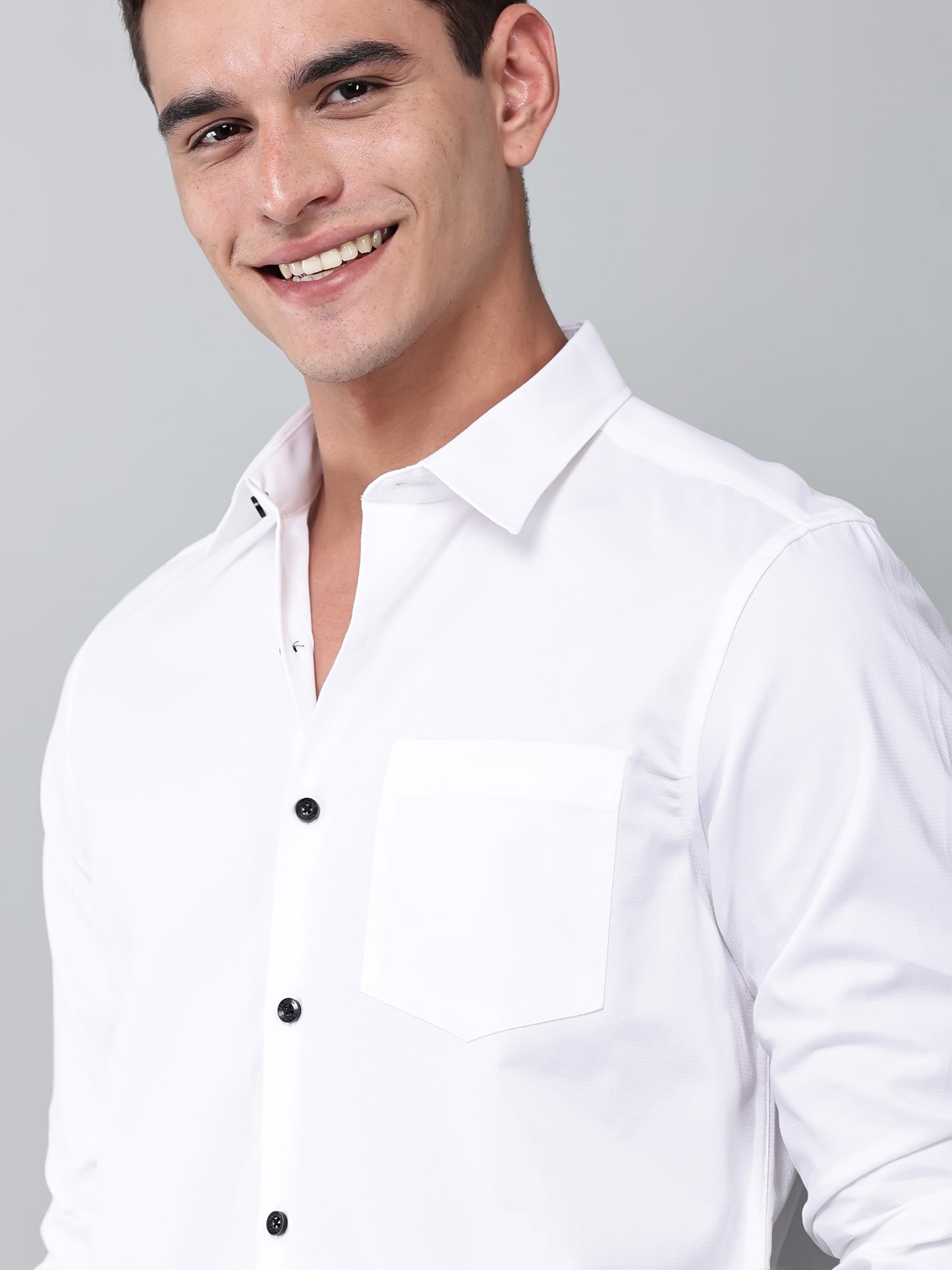 close up shot of a model wearing a contour textured classy white shirt