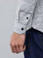 close up shot of the cuff sleeve of the linear drift sketch grey shirt