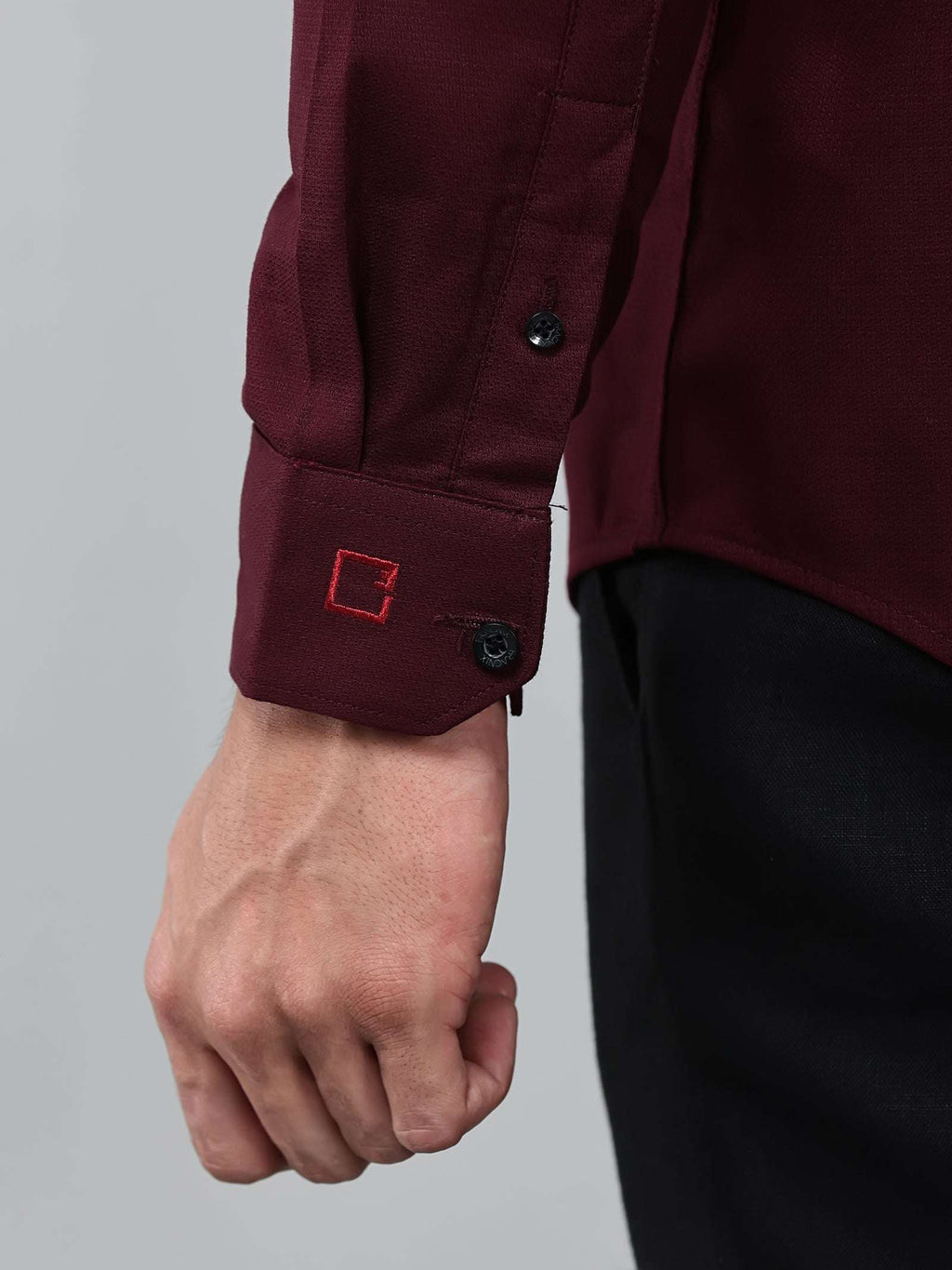 close up shot of the cuff sleeve of the contour textured cherrywood shirt