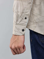 close up shot of the cuff sleeve of the linear drift sketch beige shirt